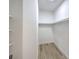 Spacious walk-in closet with ample shelving and hanging space at 5228 El Pescador Ave, Las Vegas, NV 89108