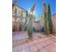 Private backyard patio with seating area and mature trees at 9071 Mount Wilson St, Las Vegas, NV 89113