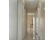 Long hallway with tile flooring and doors to bedrooms at , Las Vegas, NV 89110