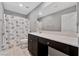 Bathroom with single vanity, toilet, and shower/tub combo at 7145 Hardwood Terrace St, North Las Vegas, NV 89084