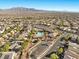 Aerial view of community pool and surrounding homes at 10630 Mount Blackburn Ave, Las Vegas, NV 89166