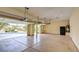 Bright and spacious three-car garage with epoxy flooring at 18 Wade Hampton Trl, Henderson, NV 89052