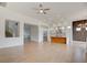 Open concept living space with kitchen and hardwood floors at 18 Wade Hampton Trl, Henderson, NV 89052