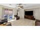 Gathering room with sliding glass doors leading to the backyard at 2113 Anserville Ave, Henderson, NV 89044