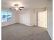 Spacious bedroom with ceiling fan and large closet at 2232 Mundare Dr, Henderson, NV 89002