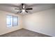 Simple bedroom with ceiling fan and carpet at 2232 Mundare Dr, Henderson, NV 89002