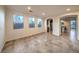 Bright living room with tiled floors and open floor plan at 2232 Mundare Dr, Henderson, NV 89002