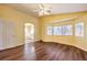 Main bedroom features wood-look floors and ensuite bathroom access at 2683 Regency Cove Ct, Las Vegas, NV 89121