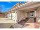 Front entrance with covered porch and walkway at 2683 Regency Cove Ct, Las Vegas, NV 89121