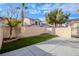 Landscaped backyard with artificial turf and patio at 29 Belle La Blanc Ave, Las Vegas, NV 89123