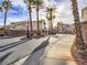 Gated community entrance with palm trees and landscaping at 29 Belle La Blanc Ave, Las Vegas, NV 89123