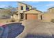 Modern two story house with attached garage at 320 Slaters Glen Ct, North Las Vegas, NV 89084