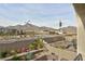 Landscaped backyard with mountain views and trampoline at 329 Rezzo St, Las Vegas, NV 89138