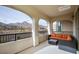 Relaxing covered patio with mountain views and comfortable seating at 329 Rezzo St, Las Vegas, NV 89138