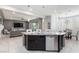 Modern kitchen with island, stainless steel appliances, and granite countertops at 329 Rezzo St, Las Vegas, NV 89138