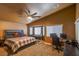 Spacious main bedroom with ceiling fan, sitting area, and office space at 3508 Pantego Ave, North Las Vegas, NV 89031