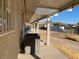 Covered patio with AC unit and view of the backyard at 3945 E Carey Ave, Las Vegas, NV 89115