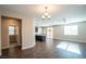 Spacious living room with hardwood floors and ceiling fan at 493 Stonegate Meadow Ave, Las Vegas, NV 89178