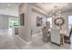 Stylish dining room features a rustic wooden table and eclectic decor at 5 Clear Crossing Trl, Henderson, NV 89052