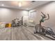 Basement exercise room with elliptical and art supplies at 5 Clear Crossing Trl, Henderson, NV 89052