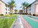 Central courtyard with palm trees and games at 555 Highland Dr # 221, Mesquite, NV 89027