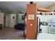 Bright kitchen with white cabinets and tile countertops at 5900 Ablette Ave, Las Vegas, NV 89122