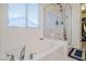 Spa-like bathroom featuring a large soaking tub and shower at 7488 Bakewell Ave, Las Vegas, NV 89179