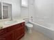 Simple bathroom with single vanity and bathtub at 7542 Port Orchard Ave, Las Vegas, NV 89113