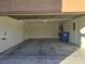 Empty garage with open door, showing interior at 8335 Golden Amber St, Las Vegas, NV 89139