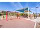 Community playground with swings and shaded play area at 116 Jay Porter Ave, Henderson, NV 89002