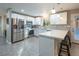 Updated kitchen featuring stainless steel appliances and white cabinetry at 1568 Seneca Ln, Las Vegas, NV 89169