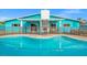 Inviting turquoise pool with a large patio and fenced yard at 1589 Raindance Way, Las Vegas, NV 89169