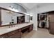 Double vanity and walk-in closet in a well lit bathroom at 1700 Saint Gregory Dr, Las Vegas, NV 89117