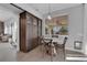 Bright dining area with round table and chairs near kitchen at 1700 Saint Gregory Dr, Las Vegas, NV 89117