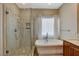 Spa-like bathroom with a soaking tub and shower at 2071 Solvang Mill Dr, Las Vegas, NV 89135