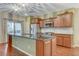 Modern kitchen with stainless steel appliances and hardwood floors at 2071 Solvang Mill Dr, Las Vegas, NV 89135