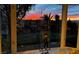 Stunning sunset view from a large window, showcasing the beautiful neighborhood at 2400 Wisconsin Dells Dr, Henderson, NV 89044