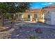 Landscaped front yard with gravel, cacti, and a walkway leading to the entrance of a single-story home at 3005 Fern Hollow Ct, Las Vegas, NV 89108