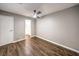 Bedroom with wood floors and ceiling fan at 3423 Garden East Dr, Las Vegas, NV 89121