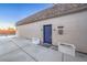 View of the home's blue front door and walkway at 3423 Garden East Dr, Las Vegas, NV 89121