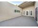 Private patio with access to storage and an outside door at 3423 Garden East Dr, Las Vegas, NV 89121