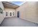 Private patio with access to a storage unit and entry door at 3423 Garden East Dr, Las Vegas, NV 89121