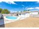 Relaxing kidney shaped pool and spacious backyard at 3941 Hudson Bay Ave, Las Vegas, NV 89110