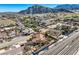 Single story home with tile roof, large backyard, and mountain views at 4775 N Grand Canyon Dr, Las Vegas, NV 89129