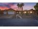 Beautiful desert home with mature landscaping and three-car garage at 4775 N Grand Canyon Dr, Las Vegas, NV 89129