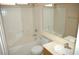 Clean bathroom with tub, toilet and updated vanity at 6408 Sundown Heights Ave, Las Vegas, NV 89130