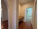 Hallway with built-in desk and access to bedrooms at 8616 Willow Cabin St, Las Vegas, NV 89131