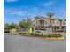 The alluring entrance to The Woverly features a gated community and lush landscaping at 965 Nevada State Dr # 43101, Henderson, NV 89002