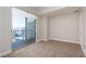 Bedroom with balcony access and city views at 150 Las Vegas Blvd # 2211, Las Vegas, NV 89101