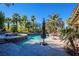 Stunning pool and spa area with palm trees and patio at 2 Via Siena Pl, Henderson, NV 89011